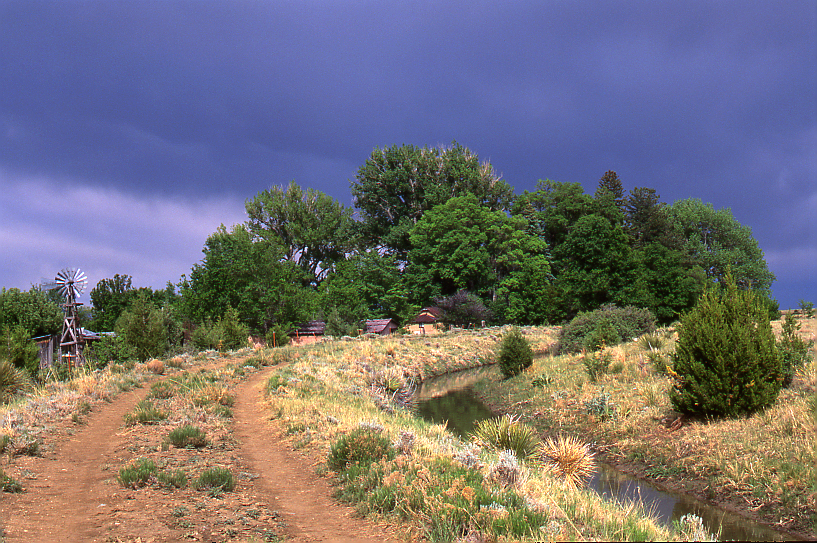 Chuck's Ranch with the acequia, Miami, NM